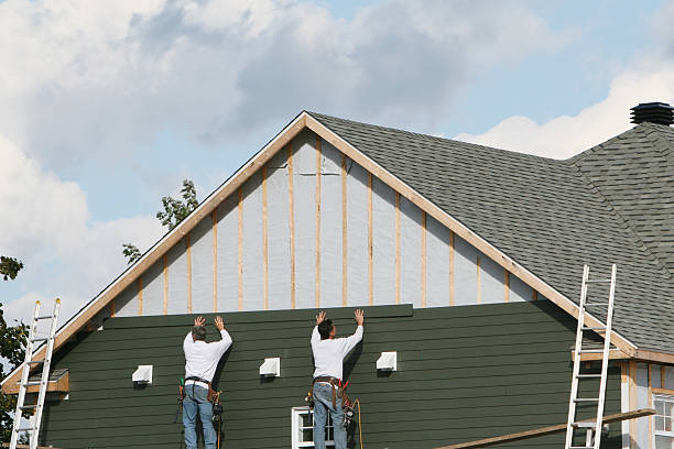 Professional Siding Replacement technician working in Claremont, NC